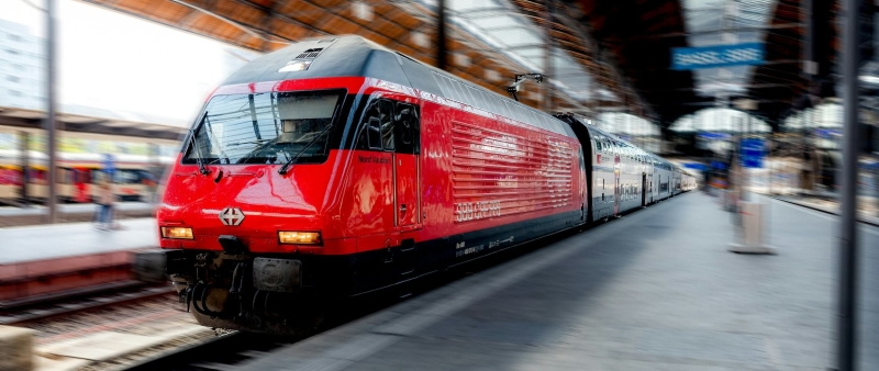 A Swiss Federal Railways (SBB) train utilizing AI-powered predictive maintenance and blockchain-backed GS1 EPCIS data tracking for enhanced rail safety